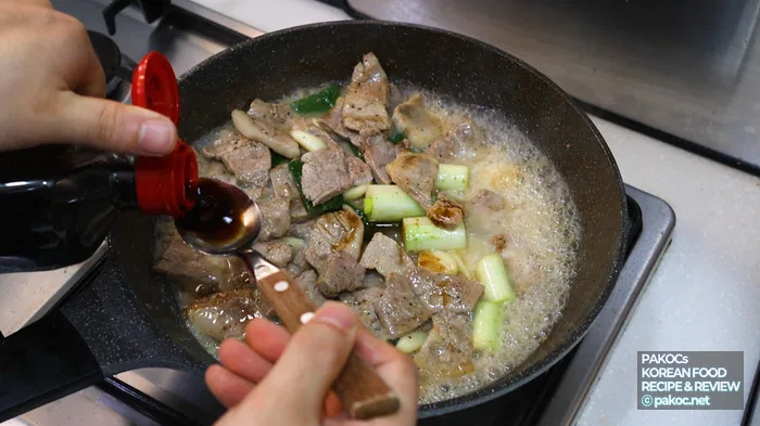 Cooking green onions and garlic over high heat