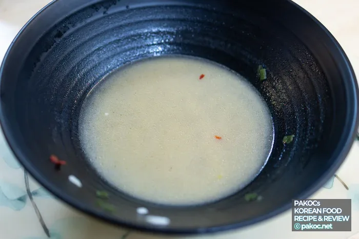 Highlighting Chicken Kalguksu’s distinctive broth flavor